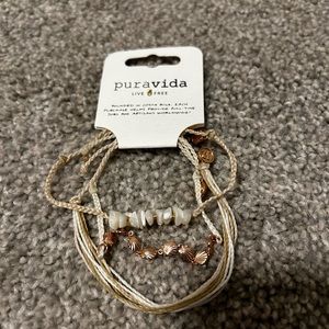 This is a set of three Puravida bracelets that are adjustable.